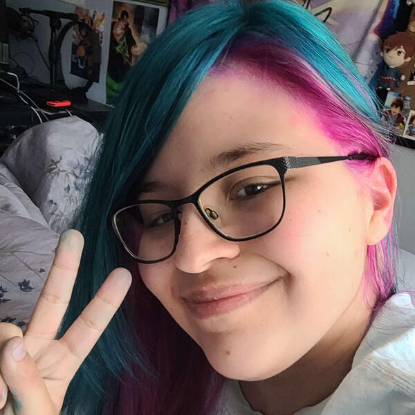 A photo of Kristi smiling at the camera